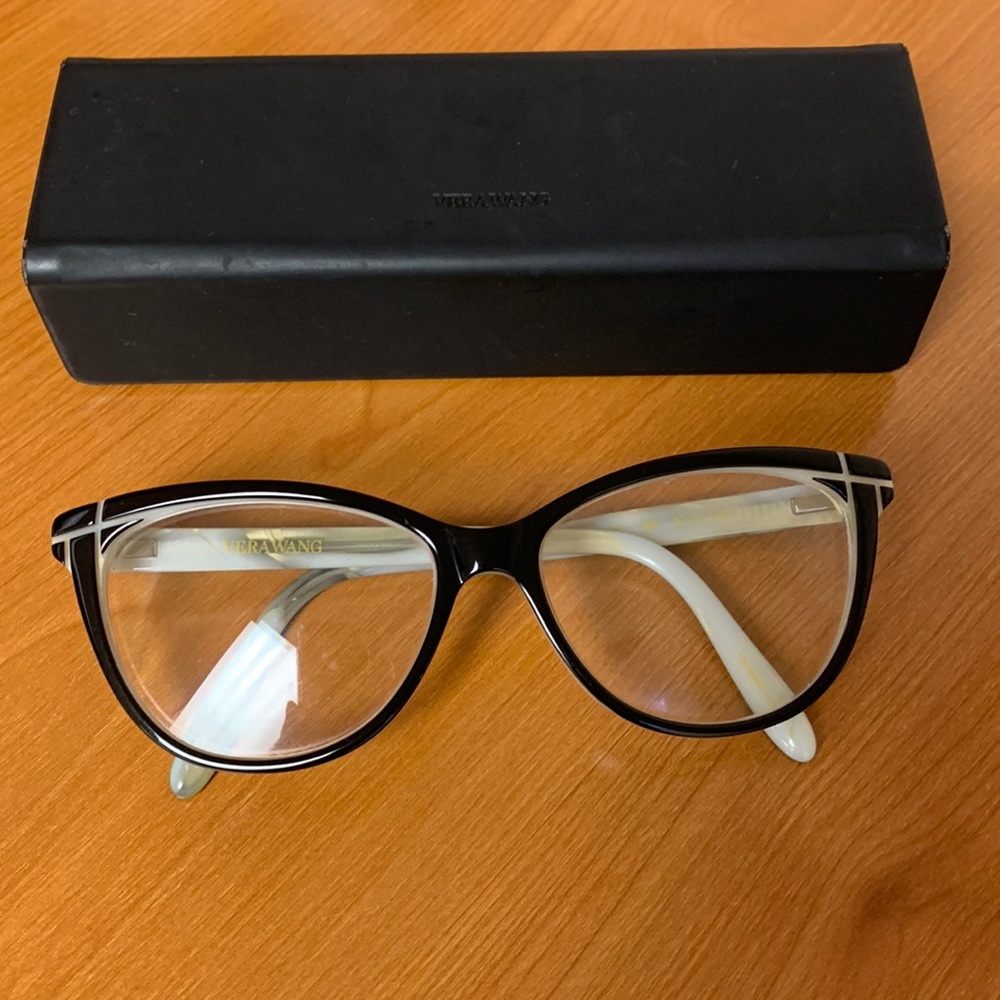 Vera Wang eyeglasses with case.